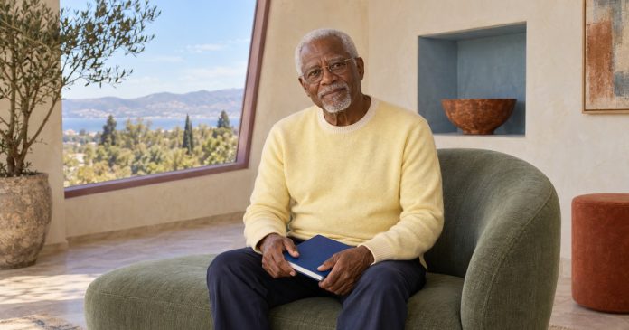 Relationship reflection at your own pace A mature man pausing with a notebook in a quiet sitting room.