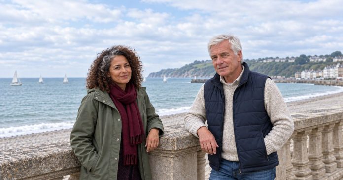 Respectful relationship conversation Two mature adults beside a seaside promenade railing
